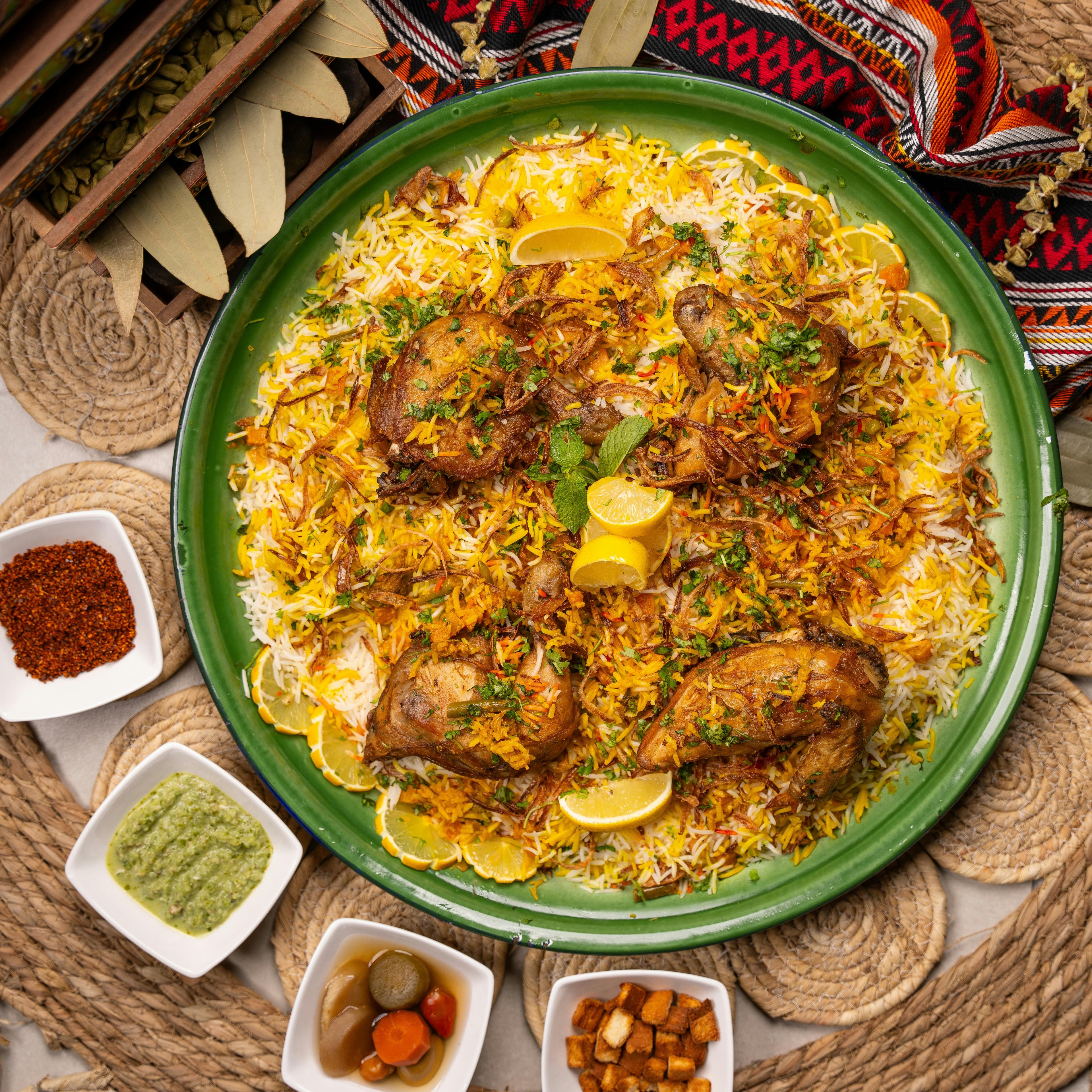 A steaming copper handi filled with saffron-infused royal biryani - Ali Dashti on Pexels
